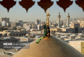 پرچم گنبد و پوش ضریح مطهر امام رضا(ع) تعویض شد